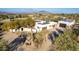 Aerial view of home with solar panels and mountain views at 4314 E Forest Pleasant Pl, Cave Creek, AZ 85331