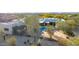 Aerial view of the property, pool, and surrounding area at 4314 E Forest Pleasant Pl, Cave Creek, AZ 85331