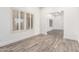 Bright dining room with wood-look tile floors and plantation shutters at 4314 E Forest Pleasant Pl, Cave Creek, AZ 85331