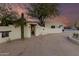 Front view of a beautiful Southwestern style home with gated entry at 4314 E Forest Pleasant Pl, Cave Creek, AZ 85331