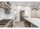 Modern kitchen features stainless steel appliances and white subway tile backsplash at 4314 E Forest Pleasant Pl, Cave Creek, AZ 85331