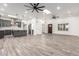 Modern kitchen with gray cabinets, white subway tile, and island at 4314 E Forest Pleasant Pl, Cave Creek, AZ 85331