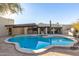 Inviting freeform pool with desert landscaping at 4314 E Forest Pleasant Pl, Cave Creek, AZ 85331