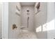 Walk-in shower with pebble floor and built-in seat at 4314 E Forest Pleasant Pl, Cave Creek, AZ 85331