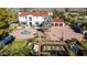 Aerial view of house, motor court, and manicured gardens at 4417 N Camino Allenada --, Phoenix, AZ 85018