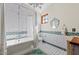 Spa-like bathroom with subway tile, a freestanding tub, and a heart-shaped mirror at 4417 N Camino Allenada --, Phoenix, AZ 85018