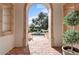 Brick courtyard with fountain view through an arched entryway at 4417 N Camino Allenada --, Phoenix, AZ 85018