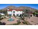 Luxury home with mountain views and a circular driveway at 4417 N Camino Allenada --, Phoenix, AZ 85018