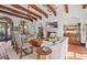 Elegant living room featuring hardwood floors, a fireplace, and large windows at 4417 N Camino Allenada --, Phoenix, AZ 85018