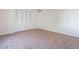 Simple bedroom with neutral carpeting and a double door closet at 4622 W Desert Crest Dr, Glendale, AZ 85301