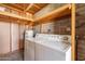 Laundry area with washer, dryer, and overhead shelving at 4622 W Desert Crest Dr, Glendale, AZ 85301