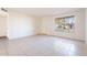 Spacious living area with tile flooring and plenty of natural light at 4622 W Desert Crest Dr, Glendale, AZ 85301