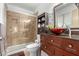 Bathroom with a large walk-in shower and modern vanity at 4639 W Becker Ln, Glendale, AZ 85304