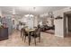 Bright dining area with table and chairs, open to the living room at 4639 W Becker Ln, Glendale, AZ 85304