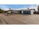 House exterior with gray garage door and gravel landscaping at 4639 W Becker Ln, Glendale, AZ 85304