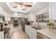 Kitchen with stainless steel appliances and white cabinets at 4639 W Becker Ln, Glendale, AZ 85304