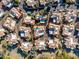 Aerial view of complex showing building rooftops and parking at 5018 E Siesta Dr # 3, Phoenix, AZ 85044