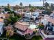 Aerial view of community pool, patio, and surrounding buildings at 5018 E Siesta Dr # 3, Phoenix, AZ 85044