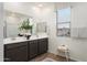 Elegant bathroom with double vanity and large shower at 5018 W Walatowa St, Laveen, AZ 85339