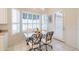 Kitchen breakfast nook with glass table and chairs at 5287 W Quail Ave, Glendale, AZ 85308