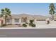 Single-story home with attached two-car garage and desert landscaping at 5287 W Quail Ave, Glendale, AZ 85308