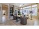 Spacious living room with fireplace and built-in shelving at 5287 W Quail Ave, Glendale, AZ 85308