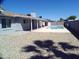 Spacious backyard with a refreshing pool and gravel landscaping at 5843 W Crocus Dr, Glendale, AZ 85306