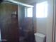 Bathroom with shower stall and tile surround at 5843 W Crocus Dr, Glendale, AZ 85306