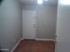 Small bedroom with tile flooring and access door at 5843 W Crocus Dr, Glendale, AZ 85306