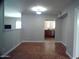 Dining area with tile floors and an open view to the kitchen at 5843 W Crocus Dr, Glendale, AZ 85306