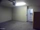 Garage with extra storage and laundry area at 5843 W Crocus Dr, Glendale, AZ 85306