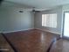 Living room area with tile floors and large window at 5843 W Crocus Dr, Glendale, AZ 85306