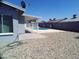 Relaxing pool area with a covered patio and a gravel yard at 5843 W Crocus Dr, Glendale, AZ 85306