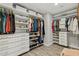 Large walk-in closet with ample shelving and drawer space at 5960 E Pershing Ave, Scottsdale, AZ 85254