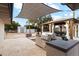 Outdoor kitchen with a built-in grill, pergola, and patio at 5960 E Pershing Ave, Scottsdale, AZ 85254