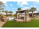 Relaxing pool area with a pergola and comfortable seating at 5960 E Pershing Ave, Scottsdale, AZ 85254