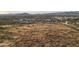 Aerial view of vacant land with mountain views and desert landscape at 601 E Amber Sun Dr, Phoenix, AZ 85085