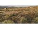 Aerial view of vacant land with mountain views and desert landscape at 601 E Amber Sun Dr, Phoenix, AZ 85085