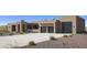 Modern desert home with stone accents and a large two-car garage at 603 E Amber Sun Dr, Phoenix, AZ 85085