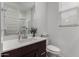 Clean bathroom with modern vanity, large mirror, and shower/tub combo at 646 S Jacana Ln, Gilbert, AZ 85296