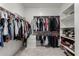 Large walk-in closet with ample shelving and hanging space at 646 S Jacana Ln, Gilbert, AZ 85296