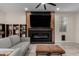 Living area featuring a stylish fireplace and built-in shelving at 646 S Jacana Ln, Gilbert, AZ 85296