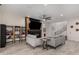 Open living space with gray sofas and a view into the kitchen at 646 S Jacana Ln, Gilbert, AZ 85296