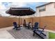 Patio with fire pit and ample seating at 646 S Jacana Ln, Gilbert, AZ 85296