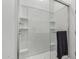 Clean shower with built-in shelving and glass enclosure at 646 S Jacana Ln, Gilbert, AZ 85296