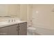 Clean bathroom with a bathtub, toilet, and modern vanity at 6850 E Mcdowell Rd # 7, Scottsdale, AZ 85257