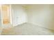 Bright bedroom with carpet, closet, and bathroom access at 6850 E Mcdowell Rd # 7, Scottsdale, AZ 85257