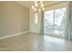 Bright dining area with large window and chandelier at 6850 E Mcdowell Rd # 7, Scottsdale, AZ 85257