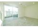 Living room with sliding glass doors leading to a patio at 6850 E Mcdowell Rd # 7, Scottsdale, AZ 85257