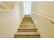 Carpeted staircase leading to upper level at 6850 E Mcdowell Rd # 7, Scottsdale, AZ 85257